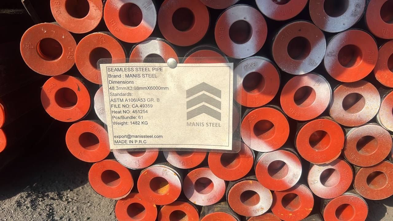Manis Steel bundle tag listing ASTM A106/A53 Grade B, 48.3 × 3.68 × 6000 mm, heat 451254, 61 pieces, 1,482 kg