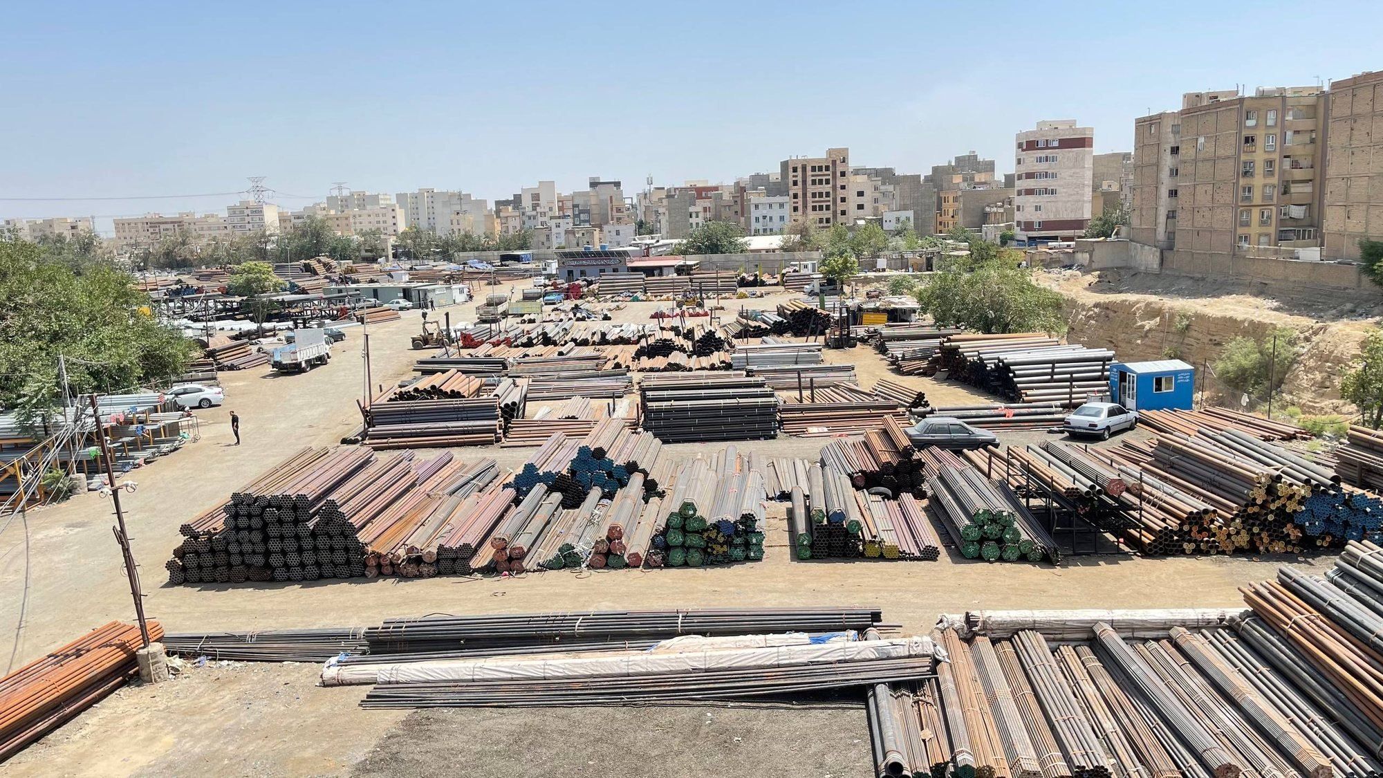 Overview of our sister brand’s open pipe yard on the edge of Tehran